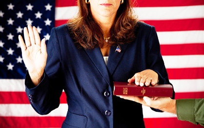 Politician: Woman Taking an Oath
on the Bible